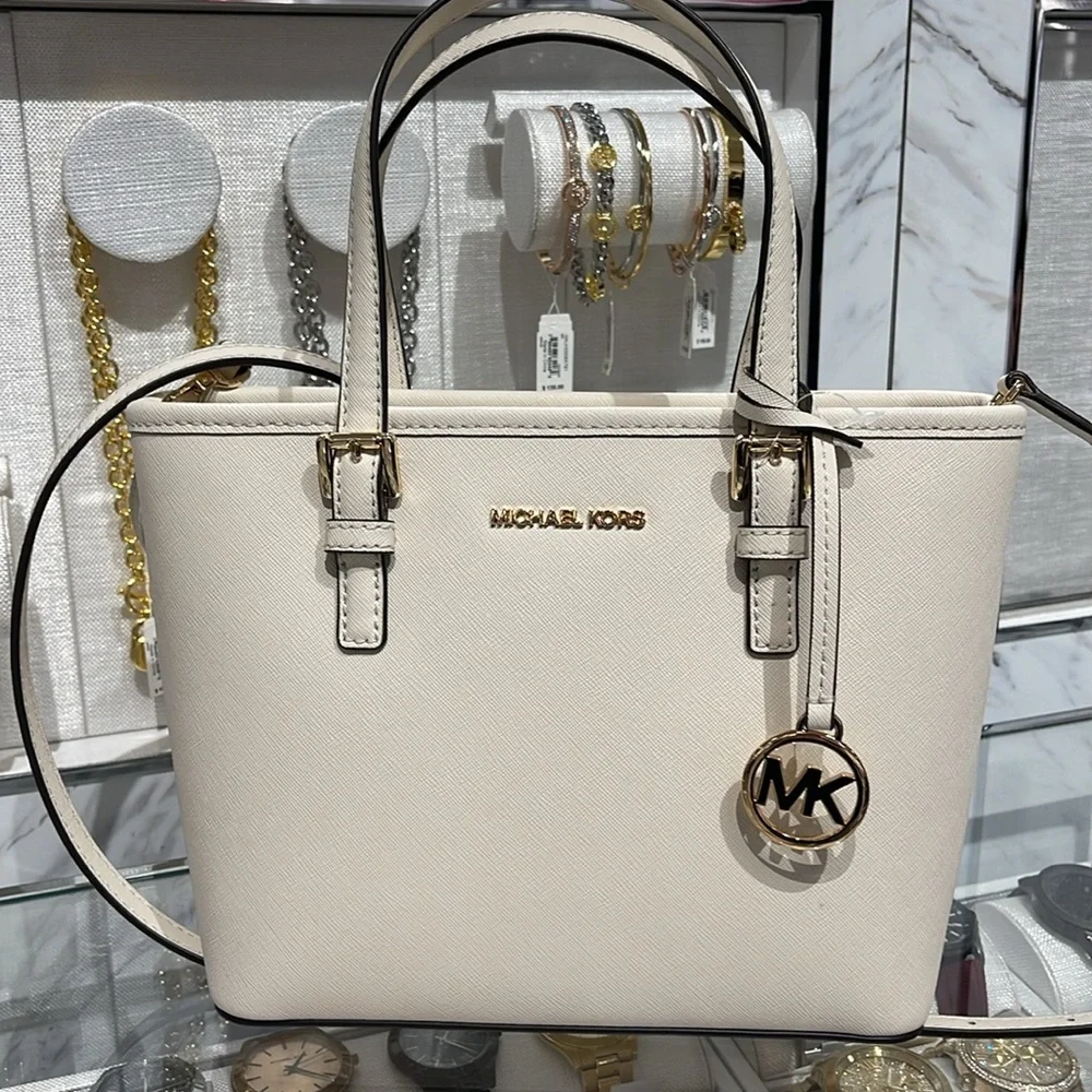 Michael Kors Jet Set Travel Extra-Small Top-Zip Tote Carryall Bag
Light Cream - Picture 5 of 16